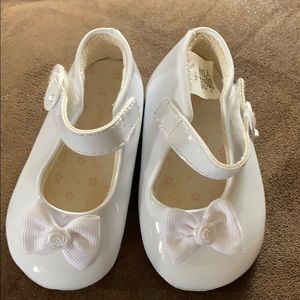 White patten baby shoes